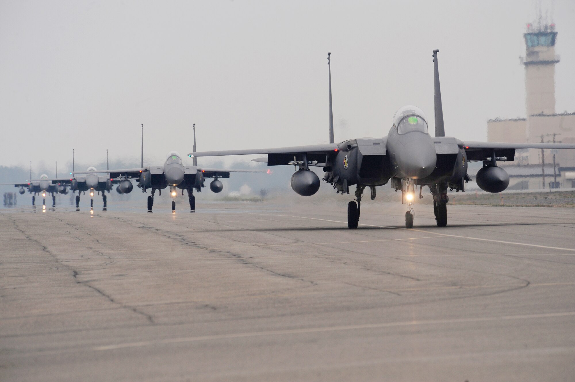 Republic of Korea Air Force F-15K Slam Eagles taxi down the runway prior to take-off during RED FLAG-Alaska 13-3 Aug. 12, 2013, Eielson Air Force Base, Alaska. U.S. and coalition forces took flight Aug. 12, marking the official start to RF-A 13-3. RF-A 13-3 runs through Aug. 23 and is a Pacific Air Forces-sponsored, Joint National Training Capability accredited exercise, enables participating units to sharpen their combat skills by flying simulated combat sorties in a realistic threat environment. (U.S. Air Force photo by Airman 1st Class Lauren-Taylor Levin/Release)