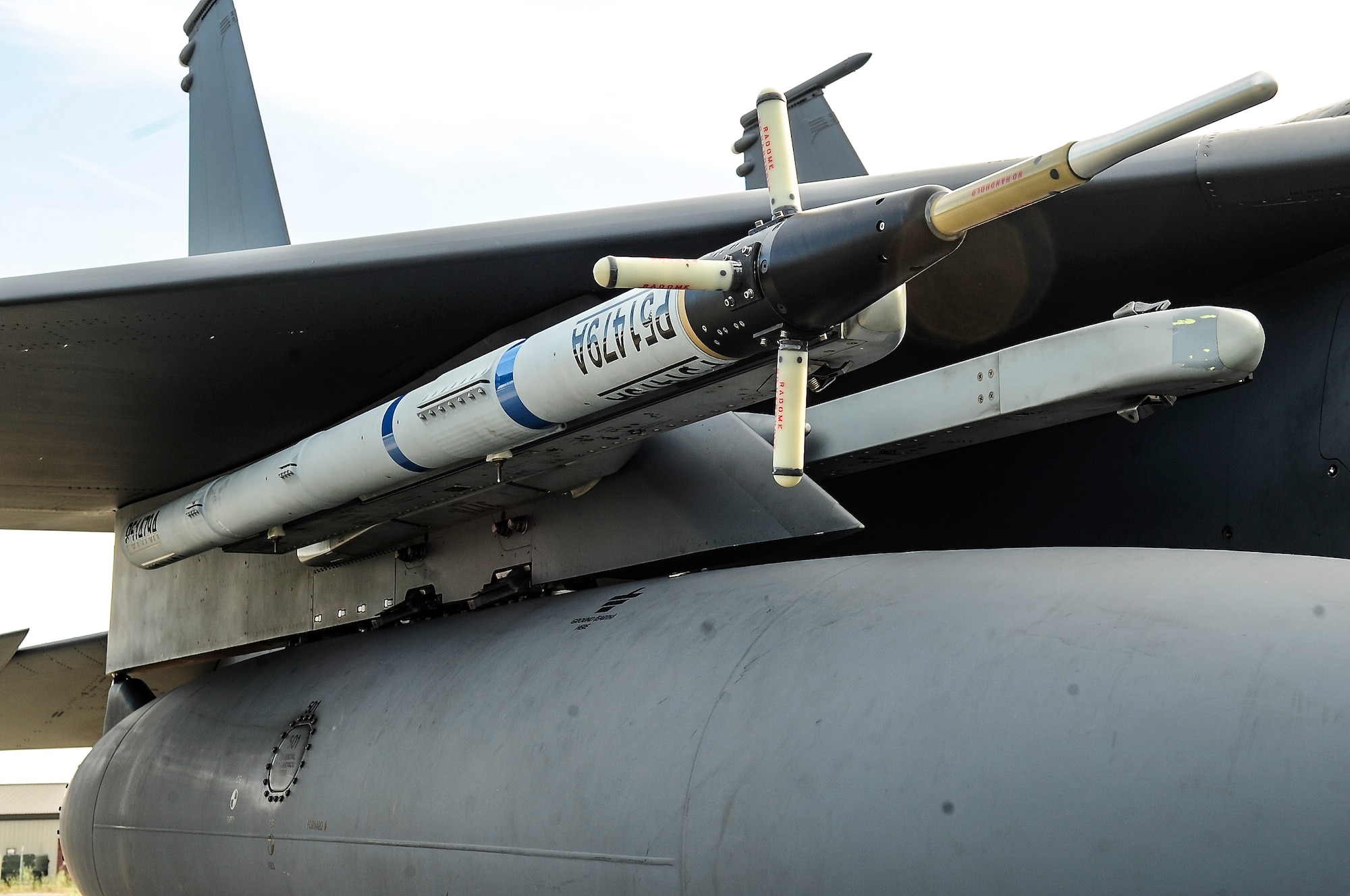 An air-combat maneuver instrument pod sits on a Japan Air-Self Defense Force F-15J Eagle Aug. 18, 2013, Eielson Air Force Base, Alaska. ACMI pods are used during post-flight briefings to help pilots interpret their movements used during flights in order to improve combat and survival capabilities. (U.S. Air Force photo by Senior Airman Zachary Perras/Released)
