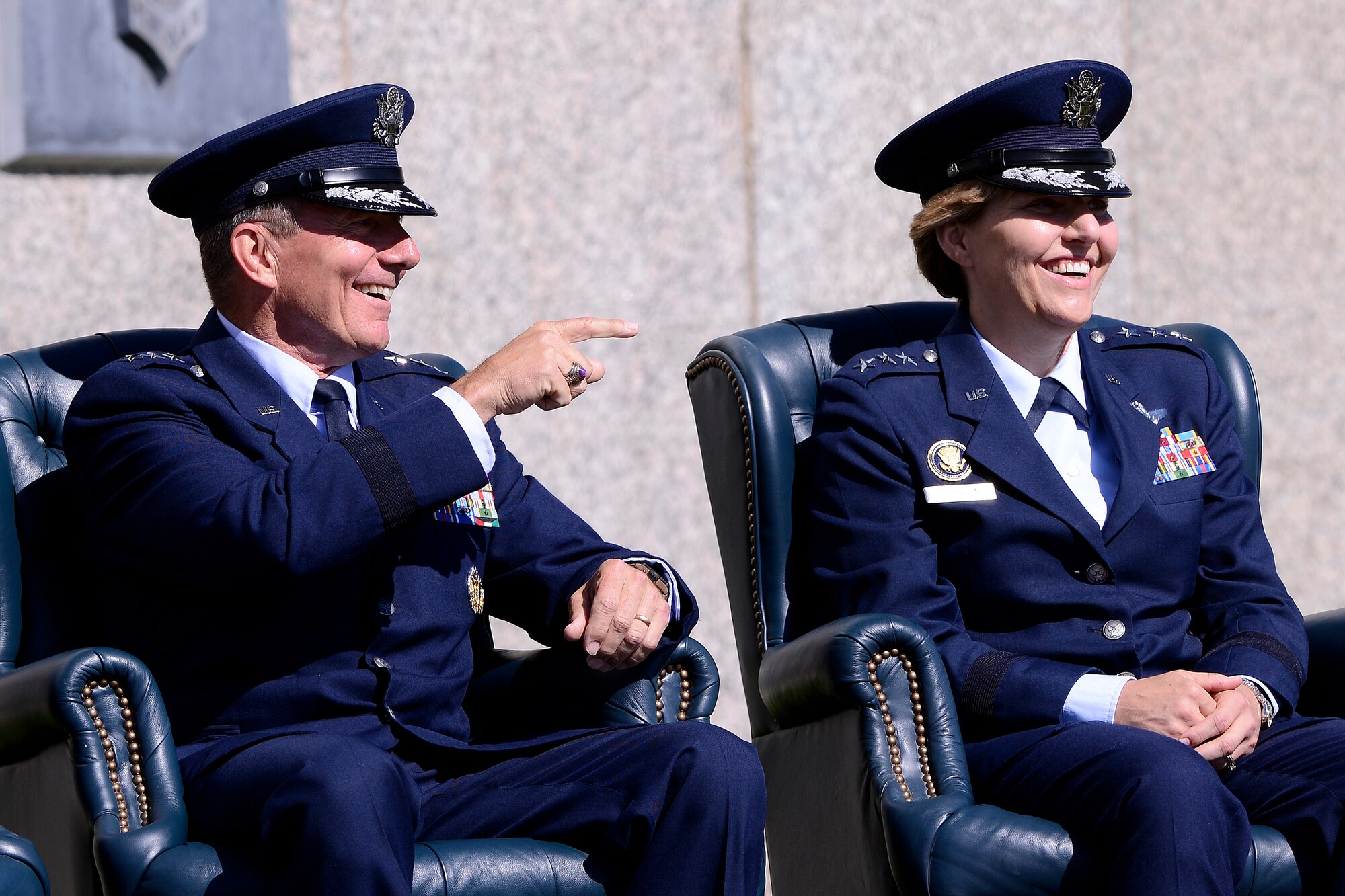 Lt. Gen. Michelle Johnson (right) and Lt. Gen. Mike Gould share a laugh during a speech at the Academy Superintendent Change of Command cermony Aug. 12, 2013. Johnson takes over for Gould as the Academy's newest superintendent. (U.S. Air Force photo/Mike Kaplan)