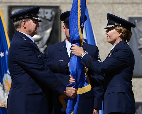 Lt. Gen. Michelle Johnson (right) accepts the guidon from Gen. Mark Welsh during the Academy Superintendent Change of Command cermony Aug. 12, 2013. Johnson is the Academy's 19th superintendent. (U.S. Air Force photo/Mike Kaplan)