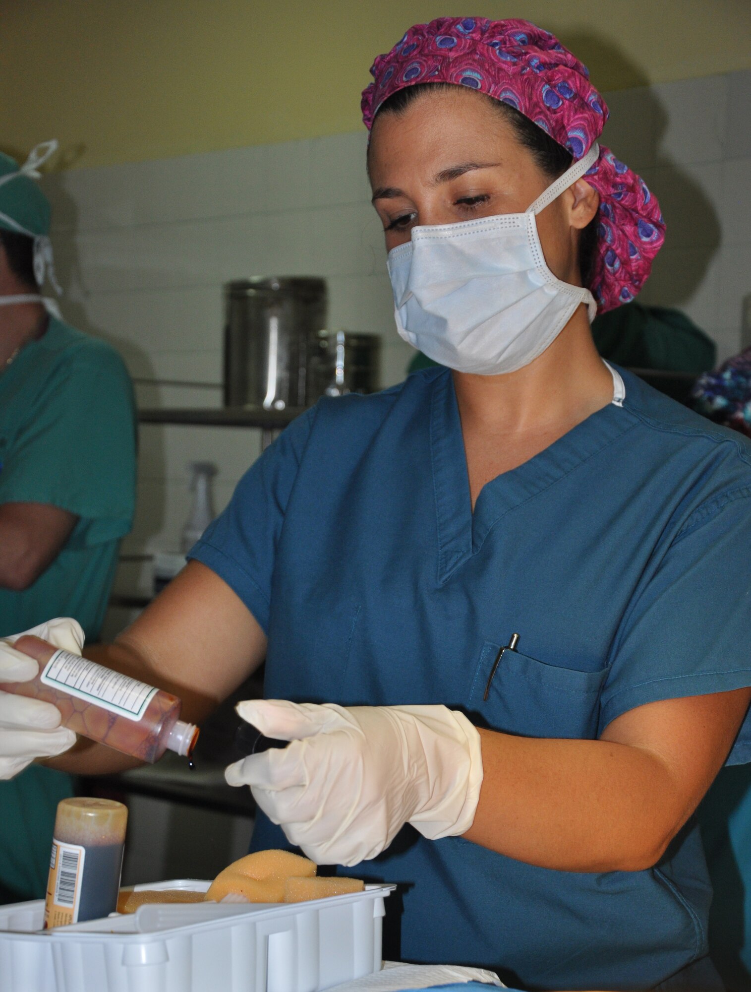 As part of a six-person mobile surgical team from Joint Task Force-Bravo U.S. Army Capt. Diane Klescewski, MEDEL operation room registered nurse, creates a prep tray prior to a gallbladder surgery Aug. 7, 2013 at a hospital in Comayagua, Honduras.  The surgical team assisted the hospital in removing three gallbladders and one bot fly larvae from a child’s body. MEDEL provides relevant, responsive care while enhancing the capabilities of partner nations.
