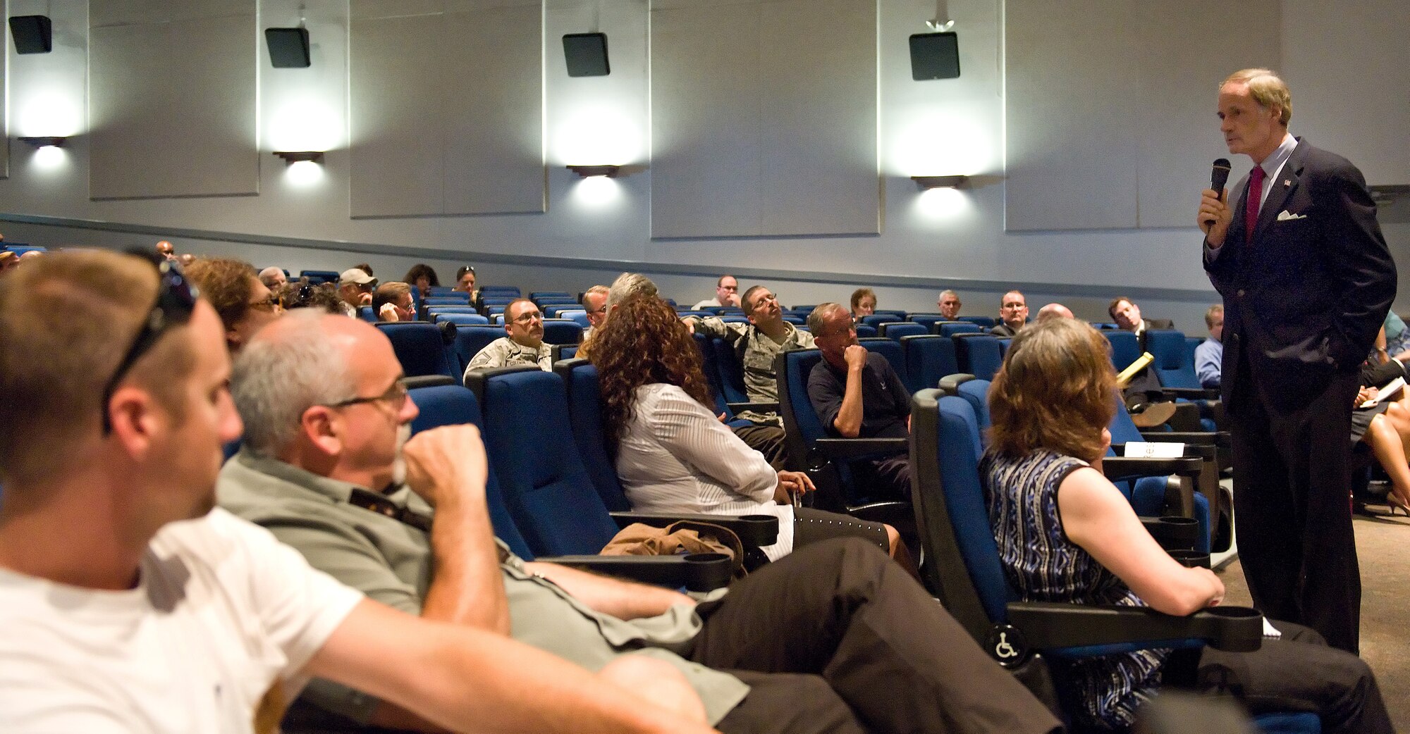 U.S. Sen. Tom Carper of Delaware addresses the crowd at a townhall meeting Aug. 8, 2013, at the base theater on Dover Air Force Base, Del. Carper spoke to Team Dover civilian employees for an hour and a half about the recent sequester and furloughs. (U.S. Air Force photo/Roland Balik)

