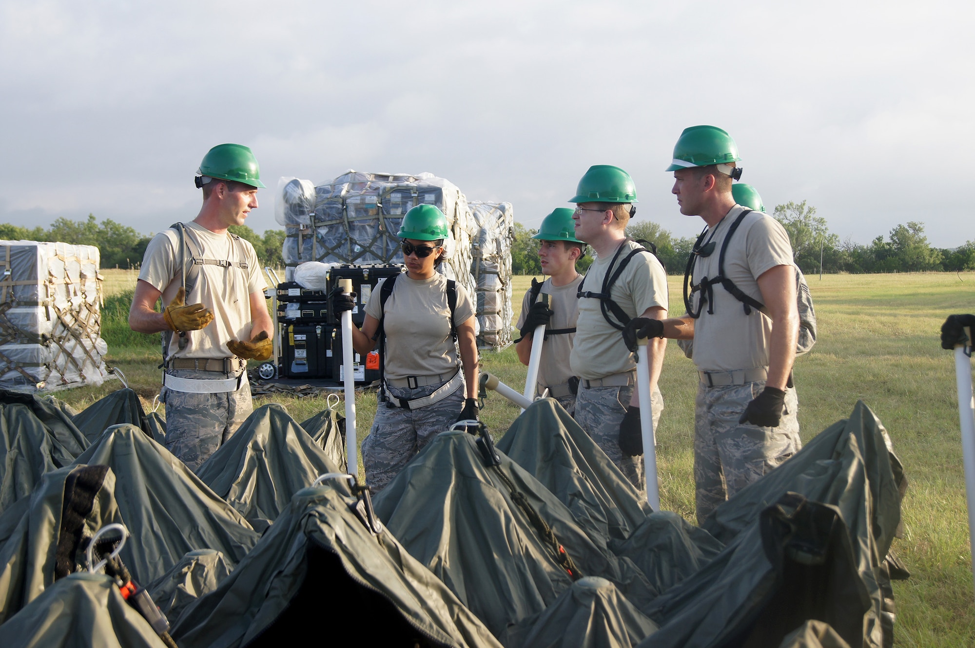 Members of the 35th Combat Communications Squadron, Tinker Air Force Base, Okla., hone their skill during a field training exercise at the Lackland AFB Media Annex in San Antonio, Texas. The 35th CBCS is one of four Reserve combat communications squadrons each located in separate regions of the country that provide theater-deployable communications during wartime and contingency operations or humanitarian missions in austere locations.
