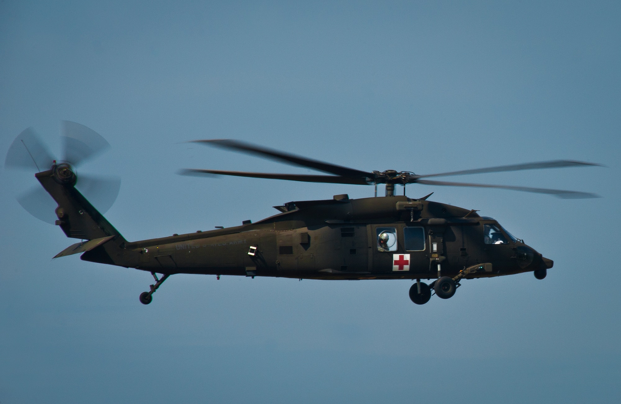 An Army UH-60 Blackhawk from the Aviation Applied Technology Directorate at Fort Eustis, Va., performs a flyby Aug. 6 while acoustic equipment on the ground records each sound it makes during the pass on the Eglin Air Force Base, Fla., range.  The sound recording was for Acoustic Week, a three-week project hosted by the 46th Test Squadron and Project Chicken Little.  The event is a cost-shared opportunity between the government and customers to collect specific and general sound data from ground and aerial vehicles.  The event began July 29 and ends Aug. 15.  (U.S. Air Force photo/Samuel King Jr.)