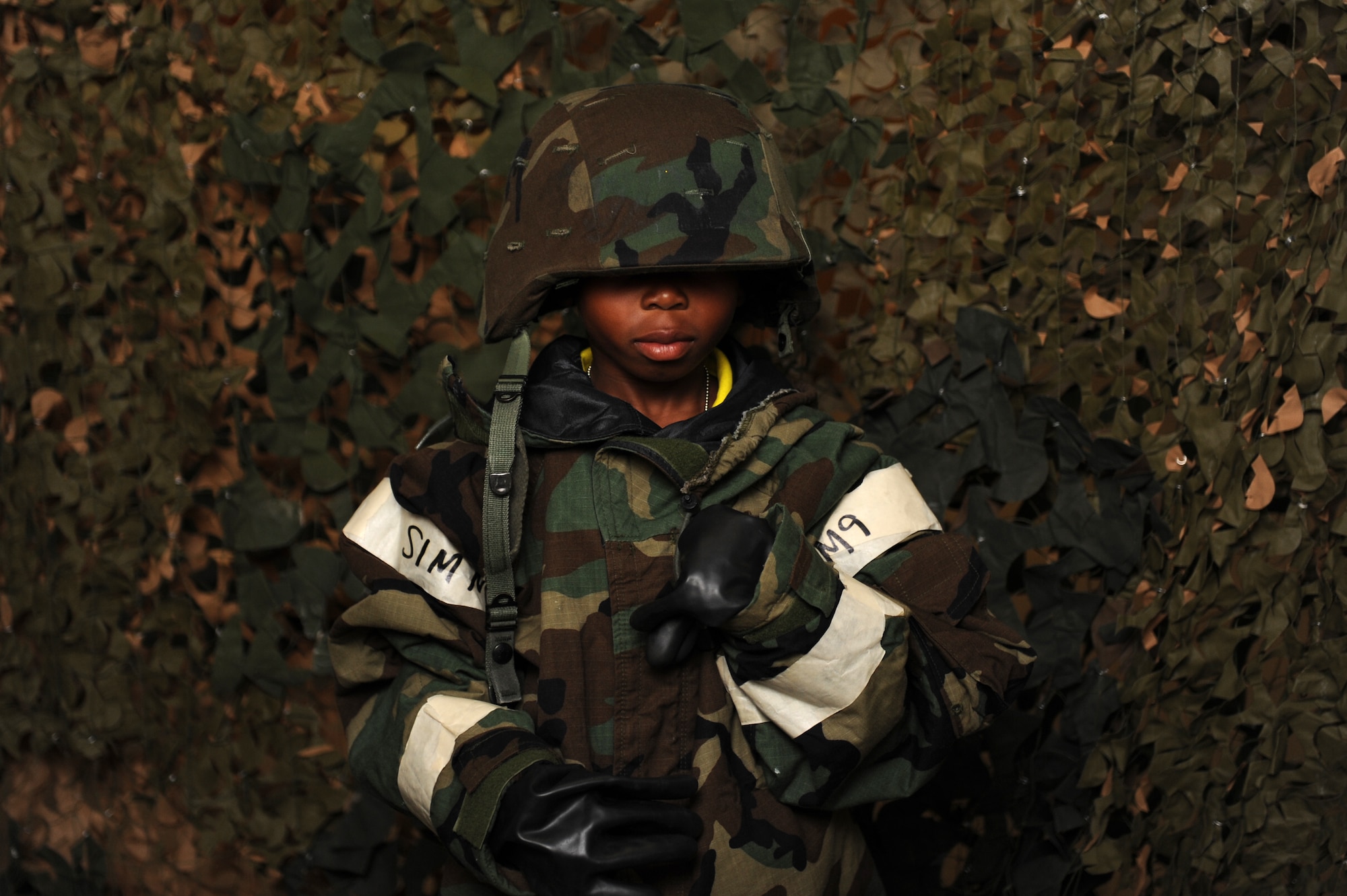 Christian Mooring poses for a photo during Operation Hero at Langley Air Force Base Va., August 7, 2013. Operation Hero let children process through a mock-deployment line to experience what their parents may go through during deployments. (U.S. Air Force photo by Airman 1st Class Kimberly Nagle/Released)
