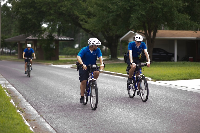 The 1st Special Operations Security Forces Squadron bike patrol ride through base housing July 24, 2013. The 1st SOSFS use the bike patrol as a way to increase their presence in the housing areas on base.
(U.S. Air Force Photo/ Staff Sgt. John Bainter)
