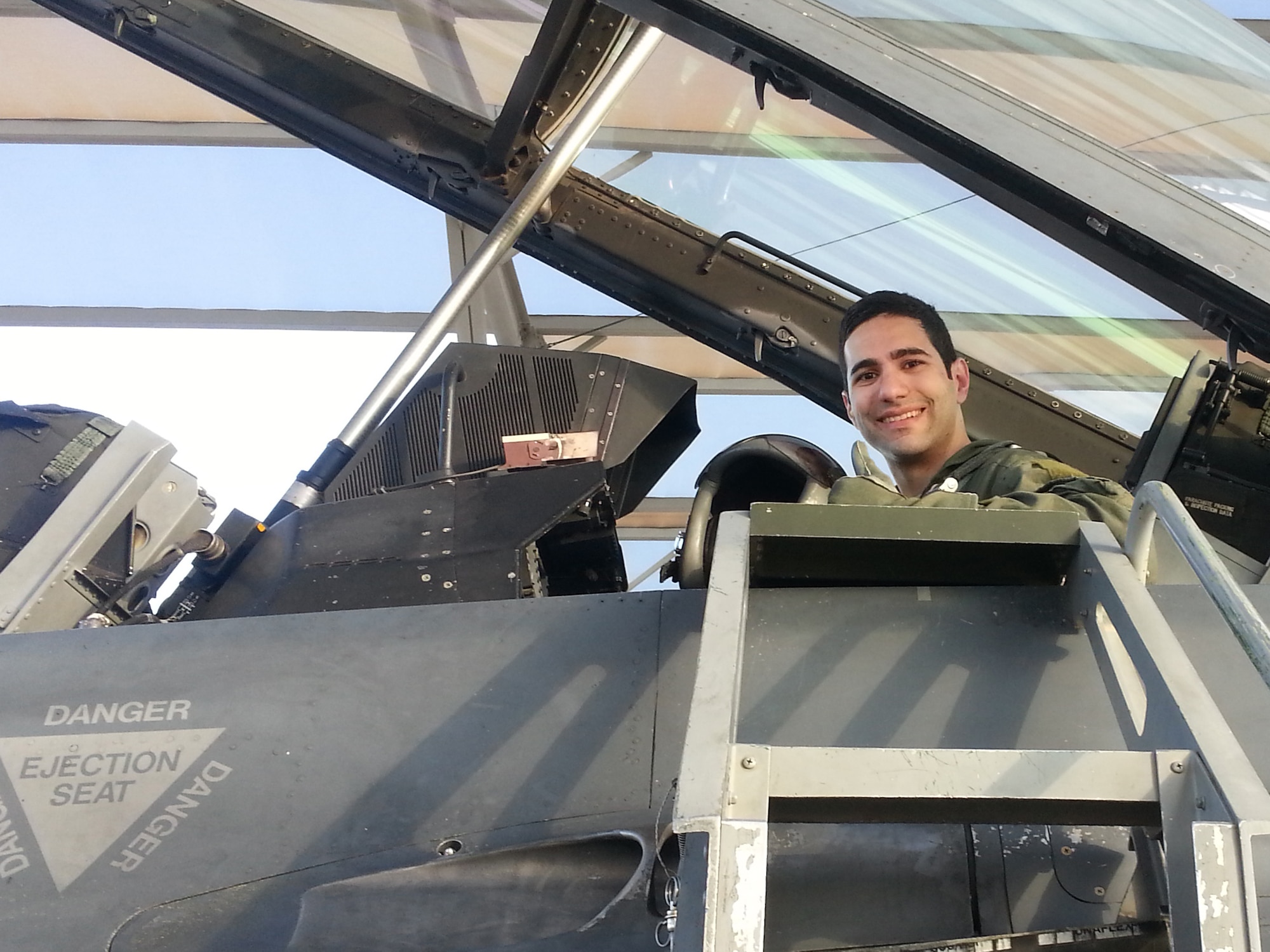 Second Lt. Billy-Joe Liane, Uniformed Services University of the Health Sciences student, prepares to exit the aircraft after a training flight July 30 in the Top Knife program at Luke Air Force Base. Medical students from the USUHS participated in a two-week training course to familiarize them with the aeromedical aspects of high performance flight. (Courtesy photo)