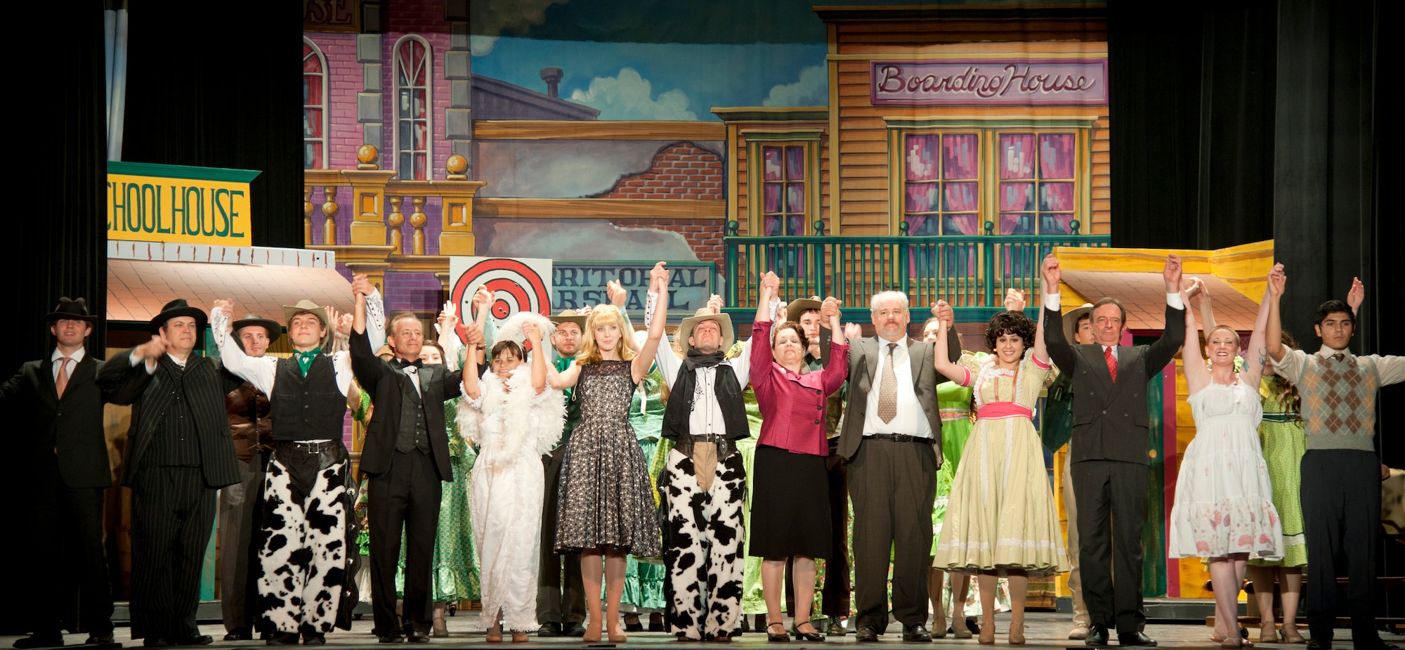 The Upstagers bow as they finish a dress rehearsal at the Paul Poag Theatre in Del Rio, Texas, July 31, 2013. The cast includes Laughlin members who have participated in the group for many years. (U.S. Air Force photo/Airman 1st Class Jimmie D. Pike)