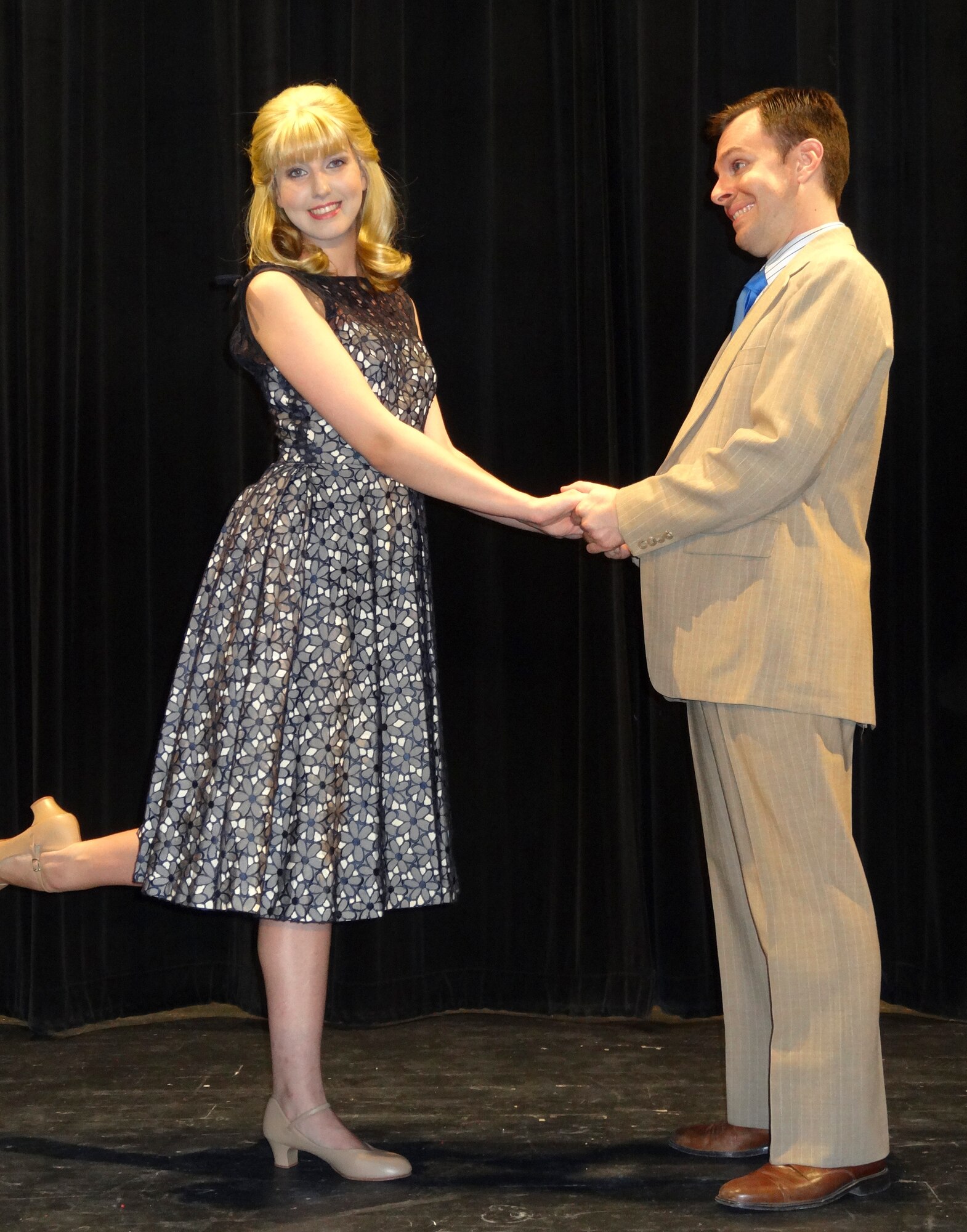 Ben Graf, 47th Civil Engineer Squadron engineer flight chief, acts on stage with his co-star Sierra Steplewski during a rehearsal at the Paul Poag Theatre in Del Rio, Texas, July 23, 2013. The Upstagers have two upcoming shows planned for Aug. 9 and 10. (U.S. Air Force photo/Airman 1st Class Jimmie D. Pike)