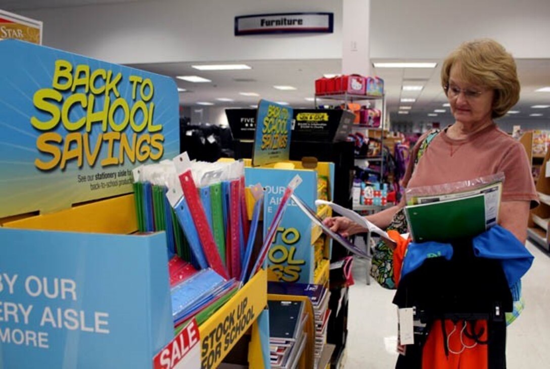 Linda Keeling, military spouse, shops for notebooks while checking off items on a back-to-school list for her five grandchildren, Aug. 7, 2013, at the Marine Corps Exchange aboard Marine Corps Base Quantico.
