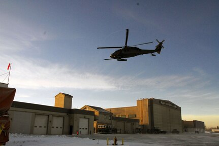 An HH-60 Pave Hawk takes off from Kulis Air National Guard Base to conduct a cold-weather training mission in 2011. A similar craft was used to rescue occupants of a downed plane.