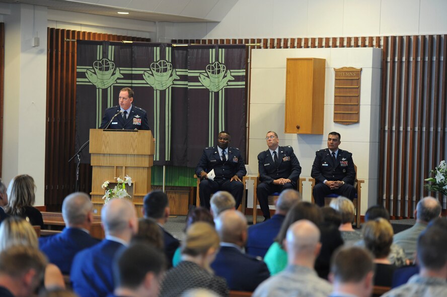 U.S. Air Force Brig. Gen. James Hecker, 18th Wing commander, gives opening remarks during a memorial service at Chapel One on Kadena Air Base, Japan, Aug. 13, 2013. This memorial service was in honor of the service and sacrifices that Tech. Sgt. Mark A. Smith made. (U.S. Air Force photo by Airman 1st Class Justin Veazie/Released)