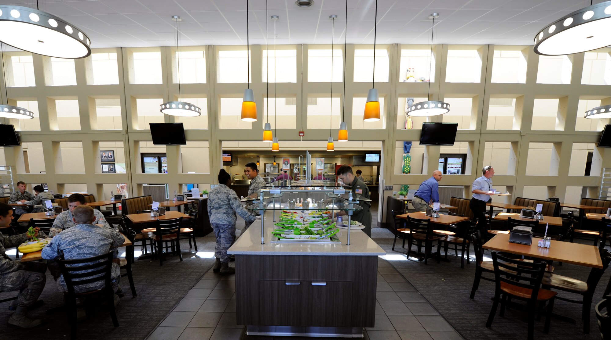Members of Team Fairchild visit the Warrior Dining Facility during lunch at Fairchild Air Force Base, Wash., Aug. 13, 2013. (U.S. Air Force photo by Senior Airman Taylor Curry)