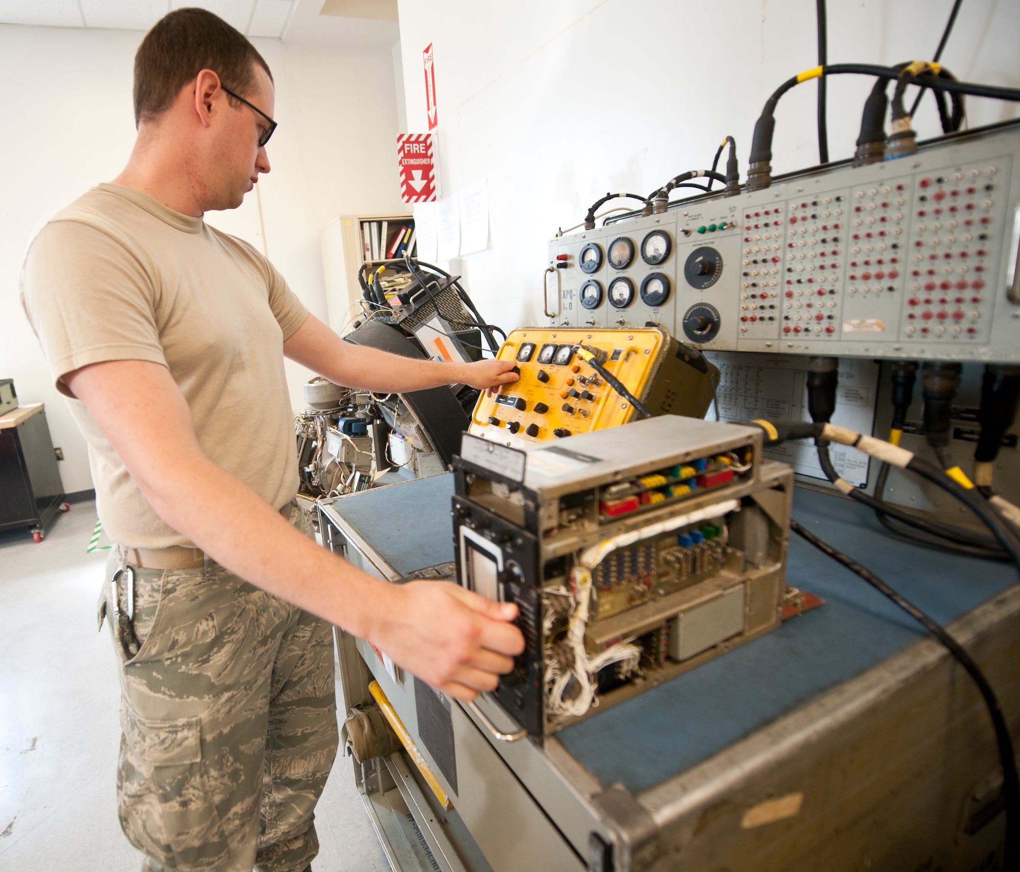 Staff Sgt. Justin Anderson, 1st Special Operations Component Maintenance Squadron mission systems craftsman, operates an APM 364 test station for an APQ-150 Radar System at the CMS on Hurlburt Field, Fla. Aug. 7, 2013. The APM 364 test station is used to diagnose problems with the APQ-150 Radar System. (U.S. Air Force photo by Senior Airman Krystal M. Garrett)