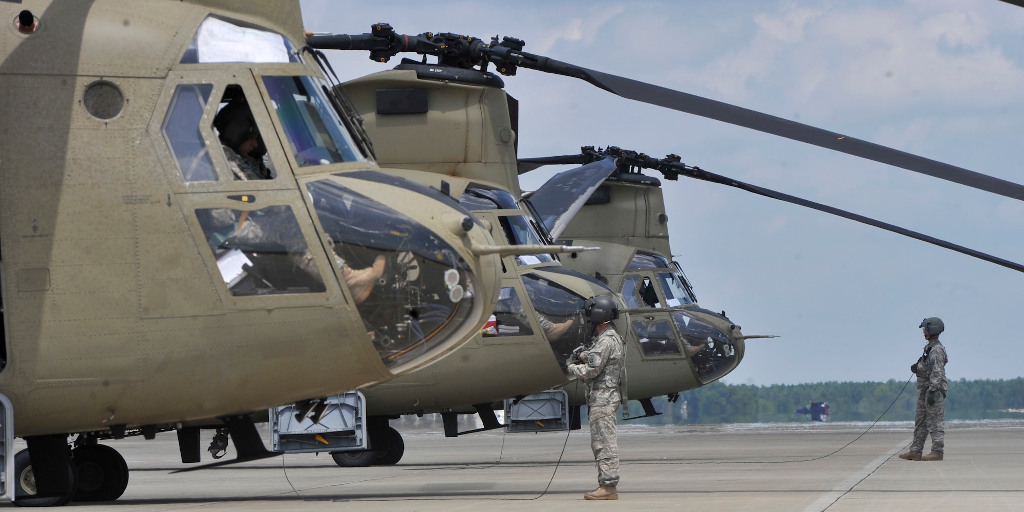 Soldiers from Company B, 3rd General Support Aviation Battalion, 82nd Combat Aviation Brigade, stationed at Fort Bragg, N.C., prepare to take off from Shaw Air Force Base, S.C., Aug. 9, 2013. The ‘Clippers’ stopped at Shaw to fuel up before heading on to Fort Polk, La. (U.S. Air Force photo by Airman 1st Class Jonathan Bass/Released)