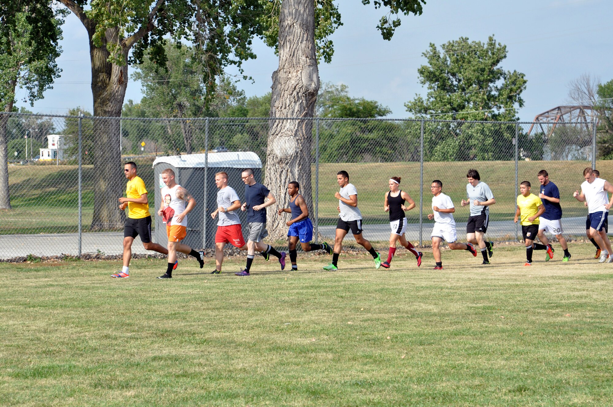 The members of FC Offutt work on their fitness prior to starting practice Aug. 11 at Haworth Park in Bellevue, Neb. The club has 13 new players on their team this year and they’re ramping up to compete in the Defender's Cup, an annual military soccer tournament held annually at Lackland Air Force Base, Texas. (Photo by Ryan Hansen)