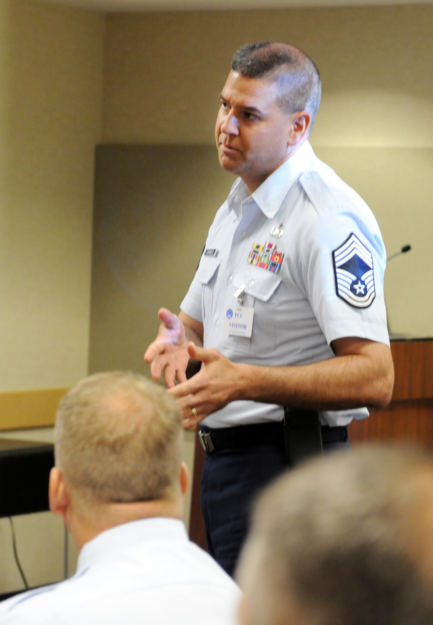 Attendees of the Chiefs Executive Course pose questions to Lt. Gen. Stanley E. Clarke III, the director of the Air National Guard about the future of the Air National Guard, furloughs and Total Force Integration at the Pentagon in Arlington, Va., 13 August 2013. (U.S. Air National Guard photo by Col Nahaku McFadden)