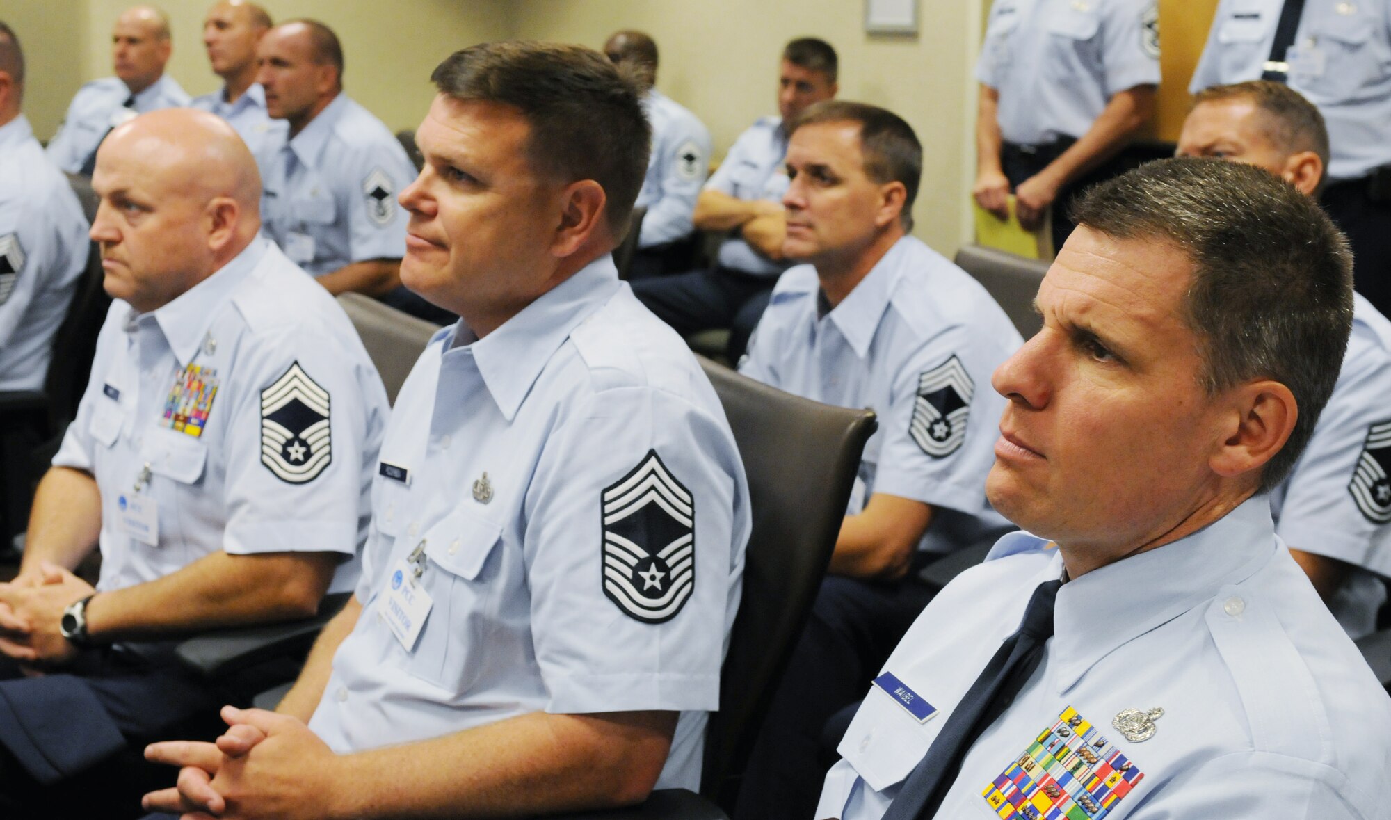 Attendees of the Chiefs Executive Course listen as Lt. Gen. Stanley E. Clarke III, the director of the Air National Guard, discusses his Four Pillars for a Total Force, the future of the Air National Guard and potential challenges ahead at the Pentagon in Arlington, Va., 13 August 2013. (U.S. Air National Guard photo by Col Nahaku McFadden)