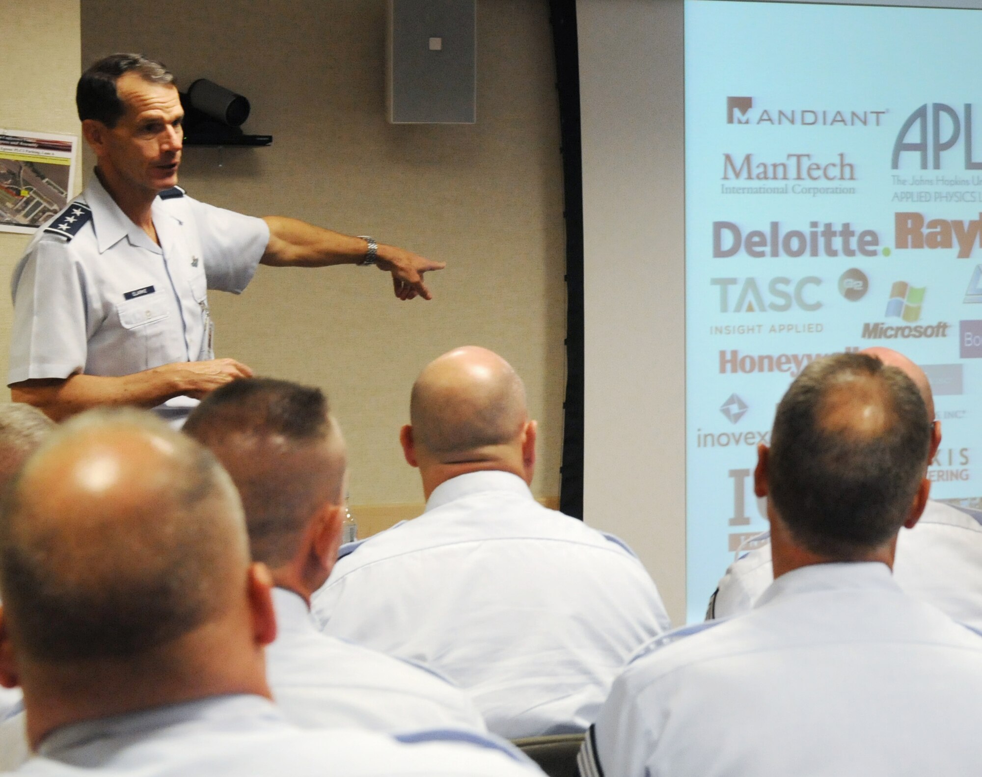 Lt. Gen. Stanley E. Clarke III, the director of the Air National Guard, addresses the Chiefs Executive Course at the Pentagon in Arlington, Va., 13 August 2013. Gen. Clarke discusses his Four Pillars for a Total Force, future of the Air National Guard and potential challenges ahead with attendees. (U.S. Air National Guard photo by 
Col Nahaku McFadden).