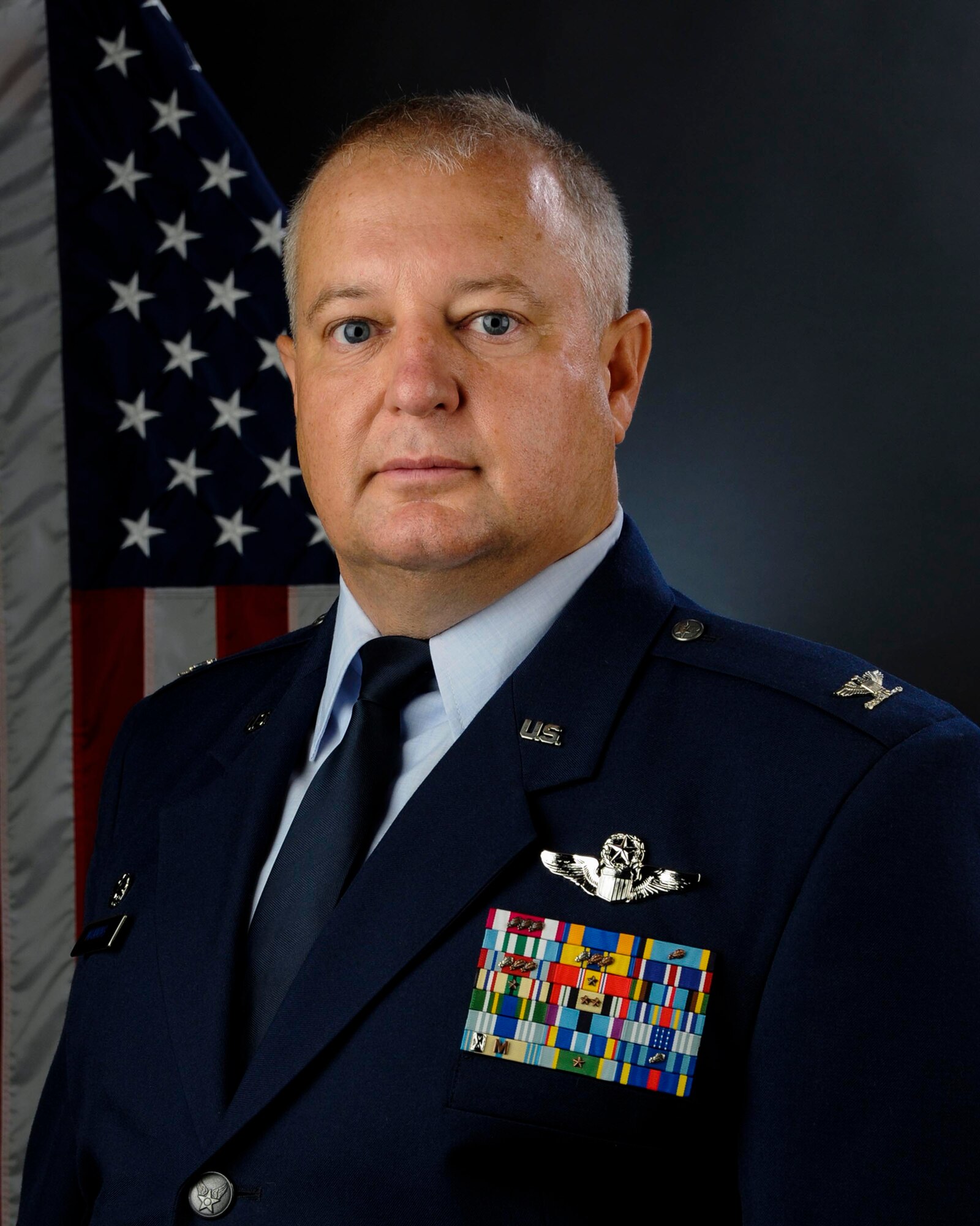 U.S. Air Force Col. Mike Manning, 169th Fighter Wing commander at McEntire Joint National Guard Base, South Carolina Air National Guard, poses for his portrait, August 9, 2013. (U.S. Air National guard Photo by Tech. Sgt. Caycee Watson/Released)