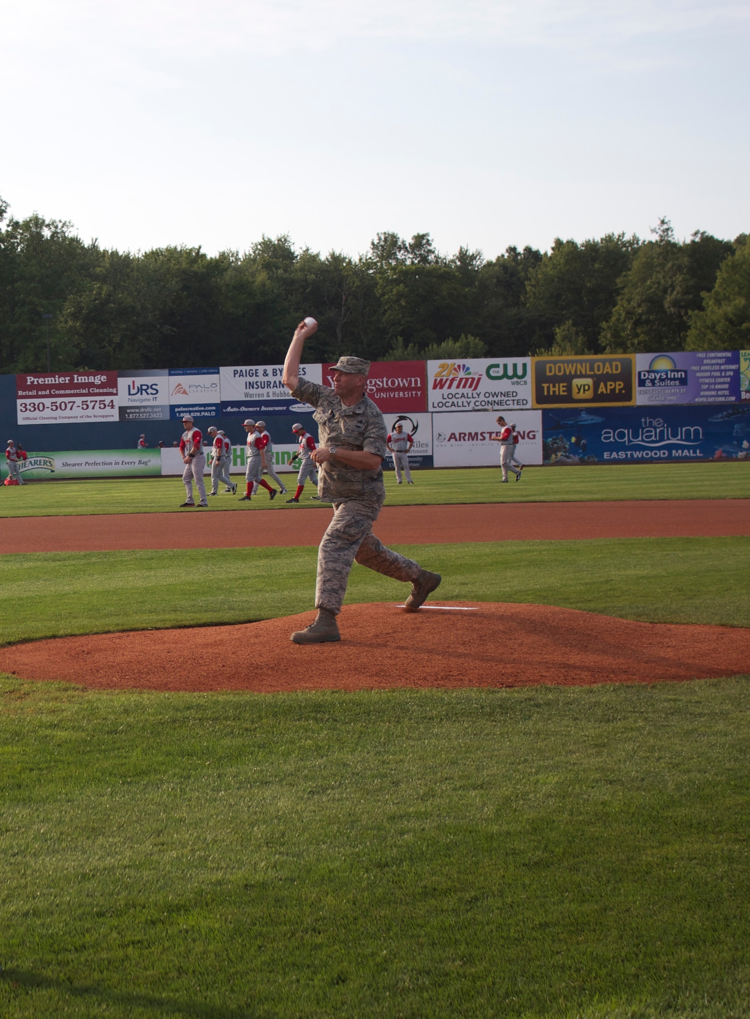 Air Force Reserve Col. David Post, 910th Maintenance Group Commander, throws out the first pitch during a minor league baseball game between the Cleveland Indians Class A affiliate Mahoning Valley Scrappers and the Lowell Spinners at Eastwood Field here, August 7, 2013. Nearly 200 Citizen Airmen along with their families, friends and co-workers were in attendance and representatives from the 910th Airlift Wing, based at nearby Youngstown Air Reserve Station, Ohio, were involved in many game night activities. Special to 910th Airlift Wing Public Affairs/Photo by Bethany Post