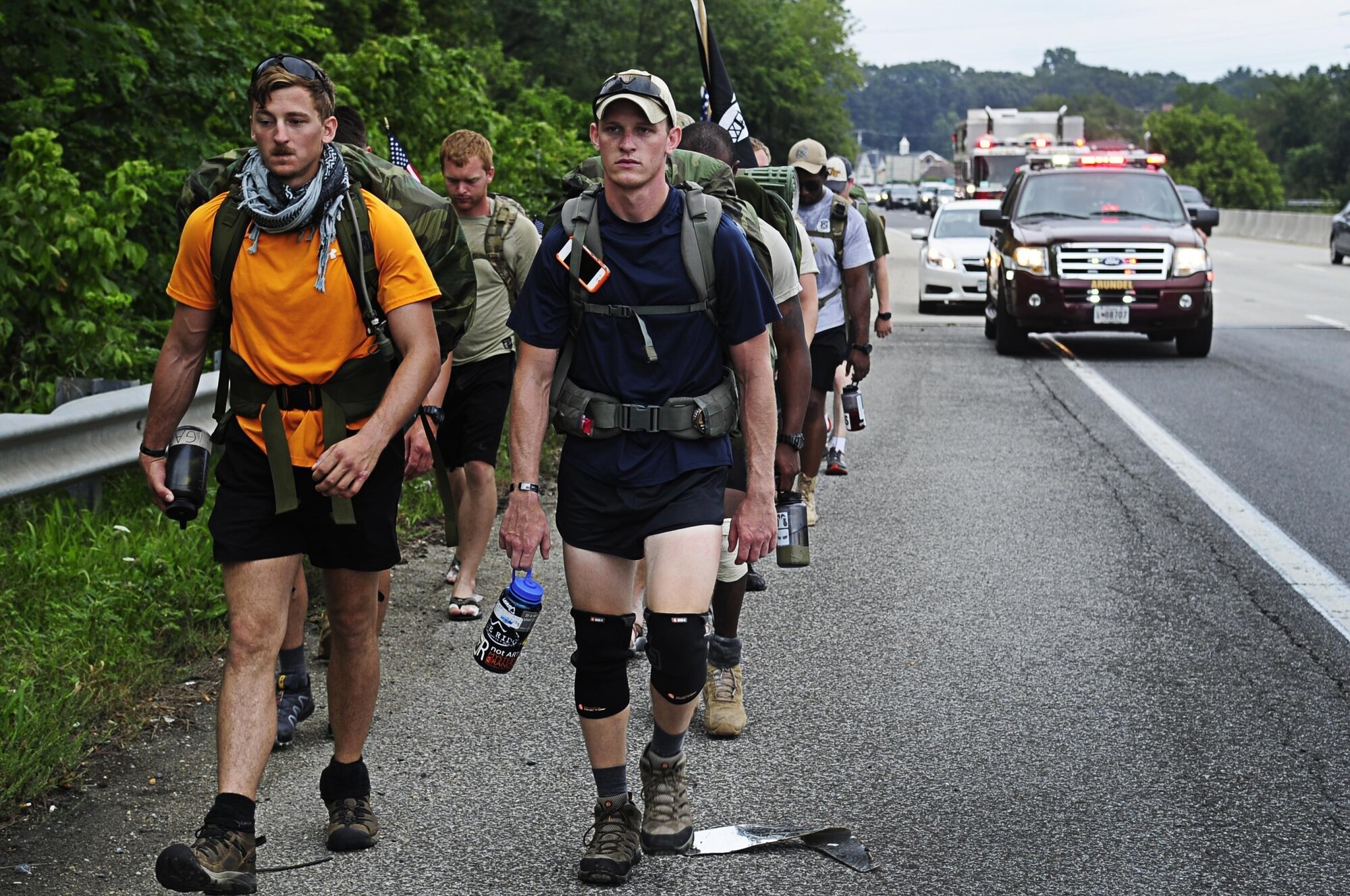 Tactical Air Control Party Airmen from the 13th Air Support Operations Squadron, Ft. Carson, Co. ruck through Gambrills, Md., during a portion of their 105-mile ruck to honor their fallen commander, Maj. David Gray, who was killed in Afghanistan last year, Aug. 7, 2013. The Airmen were marching from Dover Air Force Base, Del., the receiving point for deceased service members killed in war, to Arlington National Cemetery, to Gray’s gravesite. (U.S. Air Force photo/Senior Airman Lauren Main)