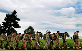 Tactical Air Control Party Airmen from the 13th Air Support Operations Squadron, Ft. Carson, Co. ruck through Arlington National Cemetery during the final leg of their 140-mile ruck to honor their fallen commander, Maj. David Gray, who was killed in Afghanistan Aug. 8, 2012. The Airmen were marching from Dover Air Force Base, Del., the receiving point for deceased service members killed in war, to Arlington National Cemetery, to Gray’s gravesite. (U.S. Air Force photo/Senior Airman Lauren Main) 

