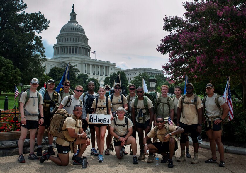A group of Airmen pose for a group photo after reaching the capitol building in Washington, D.C., Aug 8, 2013. The “DG” 140 is a 140-mile memorial ruck march from the Casualty Reception Center at Dover Air Force Base, Del., to Maj. David Gray’s headstone at Arlington National Cemetery, Aug 4-8, 2013. Many of the Airmen who marched are assigned to the 13th Air Support Operations Squadron, Fort Carson, Colo., and worked for Gray. (U.S. Air Force photo/Senior Airman Carlin Leslie)
