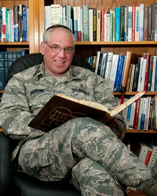 130809-F-JW079-147 Lt. Col. Joshua Narrowe, 90th Missile Wing chaplain, poses for a photo in his office on F.E. Warren Air Force Base Aug. 9, 2013. (U.S. Air Force photo by R.J. Oriez)

