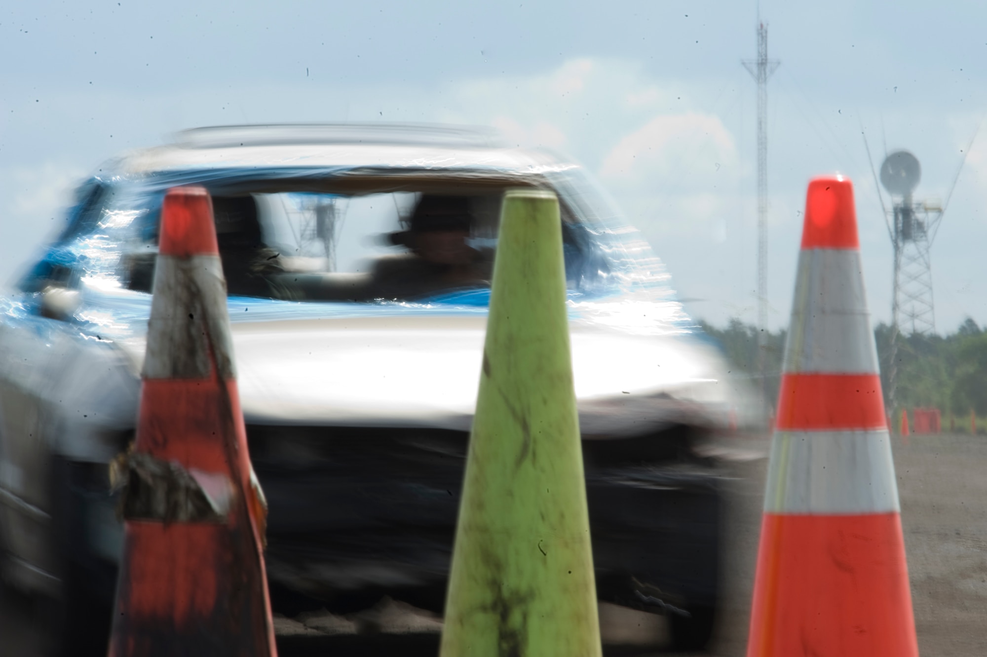 A student attempts to stop the car close enough to touch a wall of cones but avoid knocking them over during one of the exercises of the Combat Aviation Advisor Military Qualification Skills Course defensive driving module on Eglin Range, Fla., June 19, 2013.  While the defensive driving modules focused on handling skills, precision stopping played an important part in the training for the final exercises of the course.  (U.S. Air Force photo by Airman 1st Class Benjamin Kim)