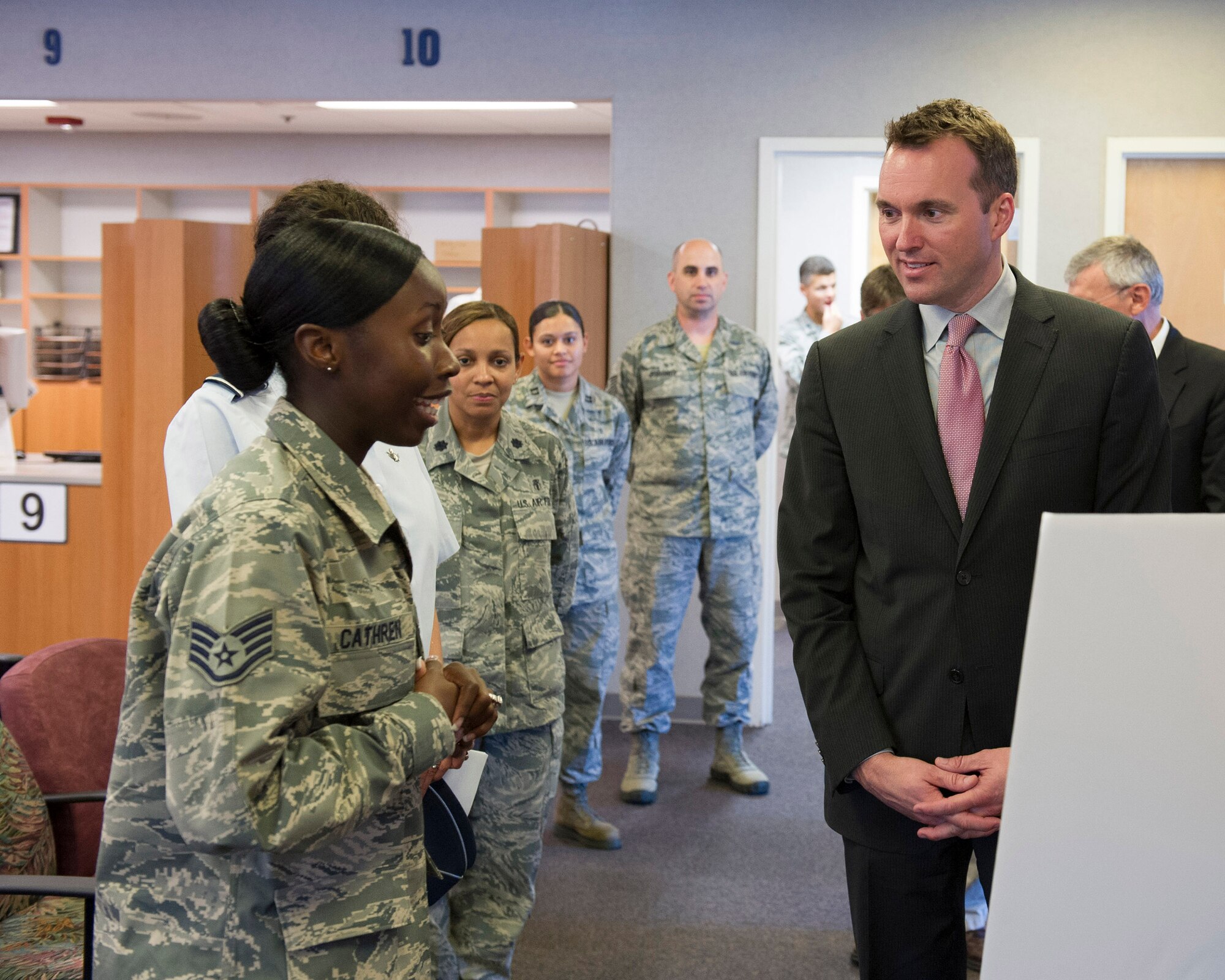 Staff Sgt. Tanisha Cathren, pharmacy technician, 45th Medical Group,
describes processes used at the Patrick Air Force Base Satellite Pharmacy to
Acting Secretary of the Air Force Eric Fanning Aug 8.
