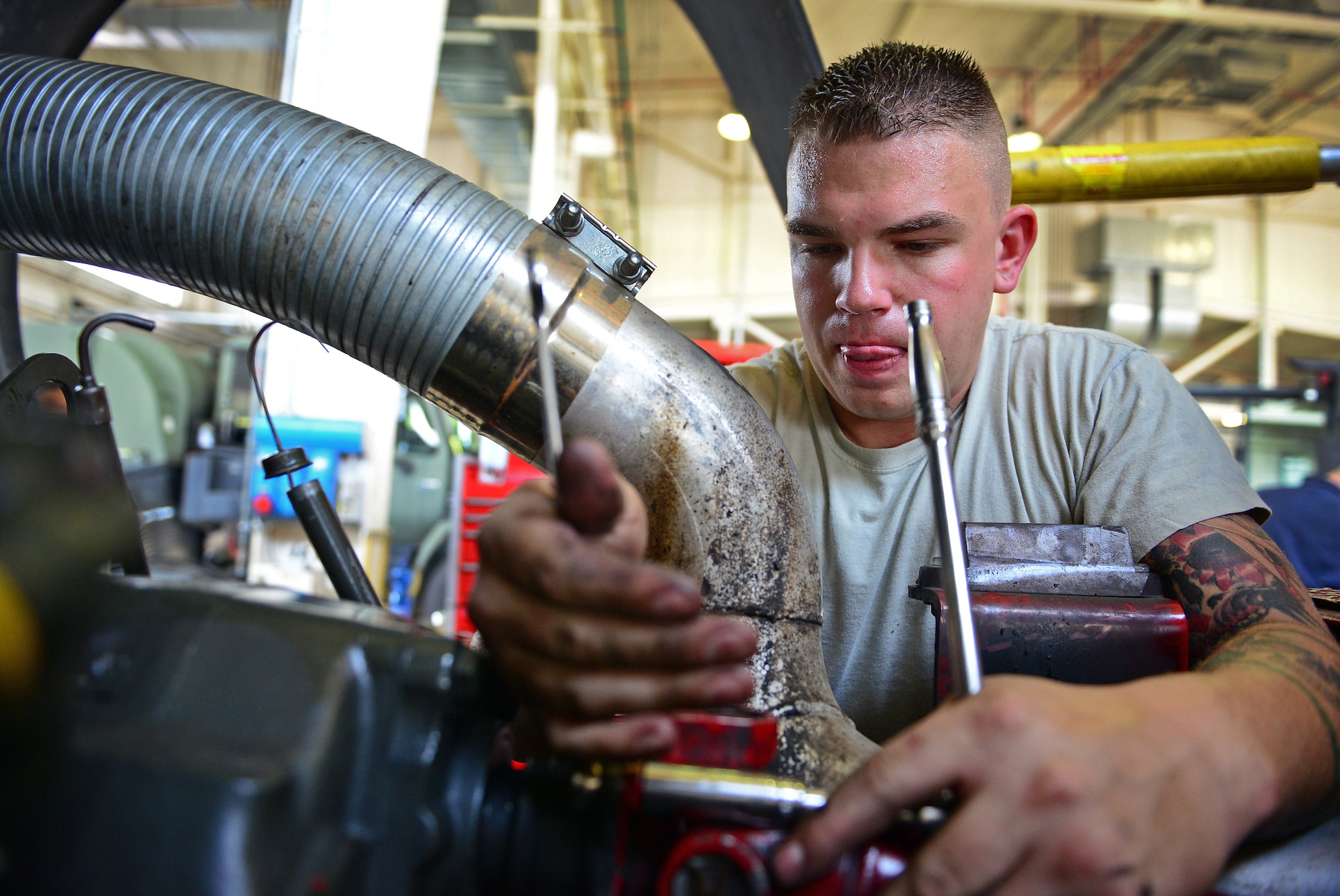Senior Airman Thomas Stark, 31st Logistics Readiness Squadron fire truck and refueling mechanic, tightens a bolt, Aug. 7, 2013, at Aviano Air Base, Italy. The vehicle management flight manages and maintains more than 900 vehicles, worth more than $80 million, located throughout seven different countries including Italy, Greece and Hungary. (U.S. Air Force photo/Airman 1st Class Matthew Lotz)