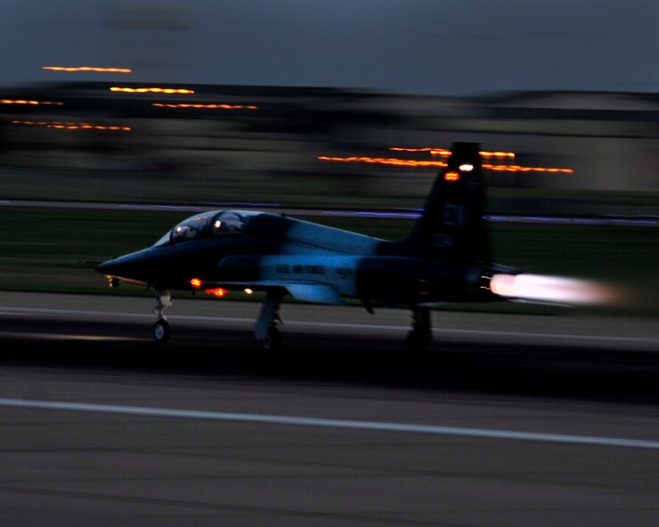 An 80th Flying Training Wing Euro-NATO Joint Jet Pilot Training Program pilot takes off for a night flight in a T-38A Talon, Aug. 6, 2013, at Sheppard Air Force Base, Texas. Pilots train to fly in any kind of instrument weather condition, to be comfortable flying at night as they are in the day. (U.S. Air Force photo/Danny Webb/RELEASED) 