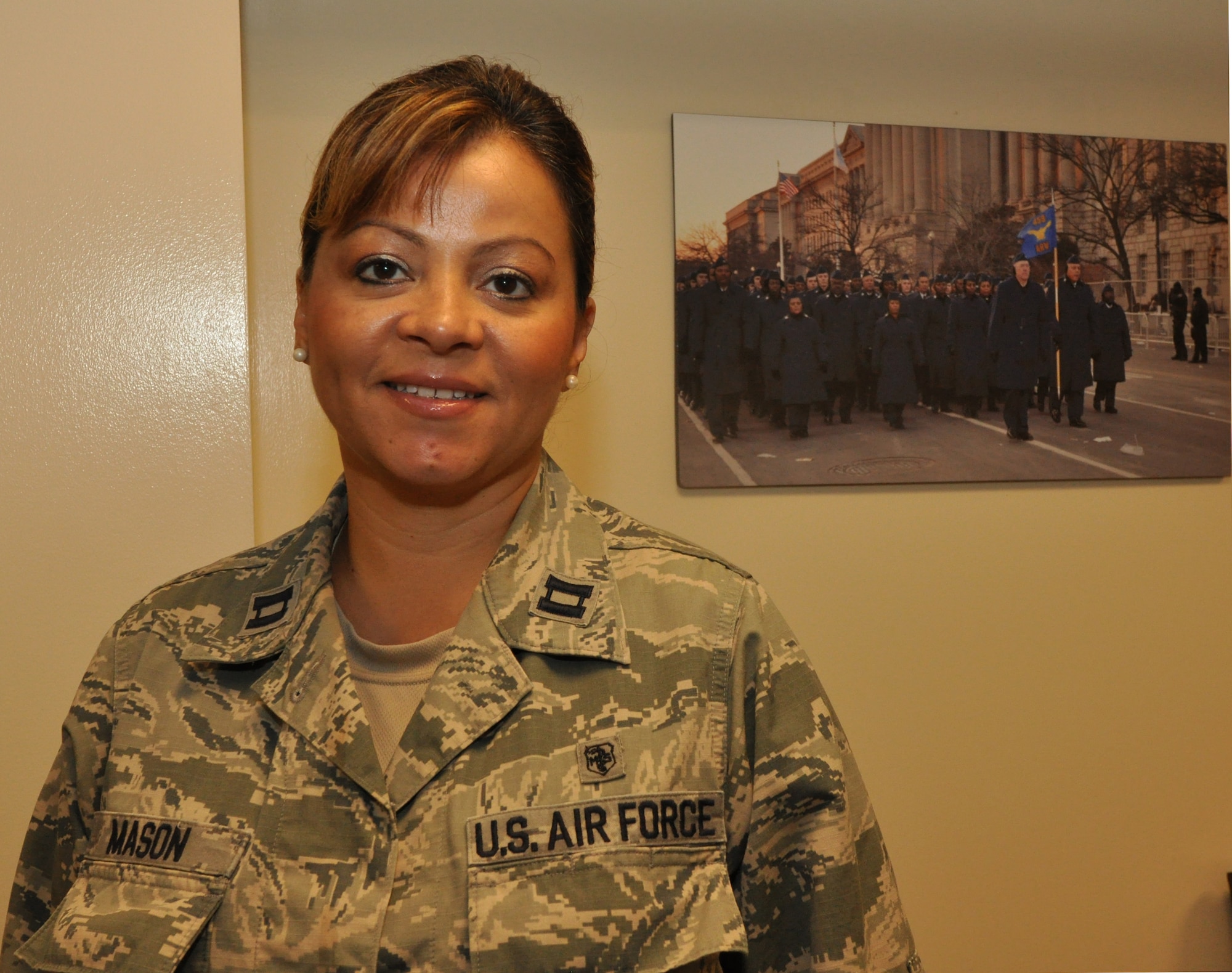 U.S. Air Force Capt. Lisa Mason smiles for the camera, at Joint Base Andrews, Md., August 11, 2013. Mason is the new protocol officer for the 459th Air Refueling Wing. (U.S. Air Force photo/ Staff Sgt. Amber Russell)