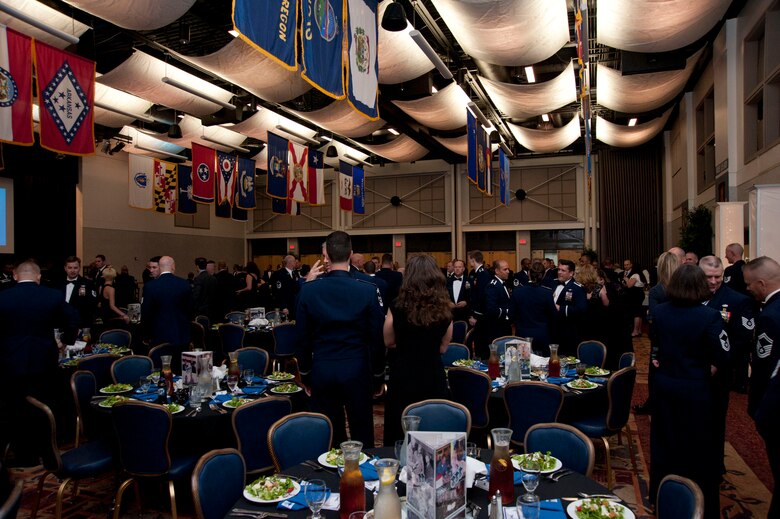 Members of Team McConnell celebrate the promotion to and the selection for promotion to master sergeant for thirty seven technical and master sergeants at the Annual Senior Non-commissioned Officer Induction Ceremony Aug. 9, 2013, at McConnell Air Force Base, Kan. Airmen came from as far away as Ft. Riley, Kan., to take part in this special ceremony. (U.S. Air Force photo/Airman 1st Class Victor J. Caputo)