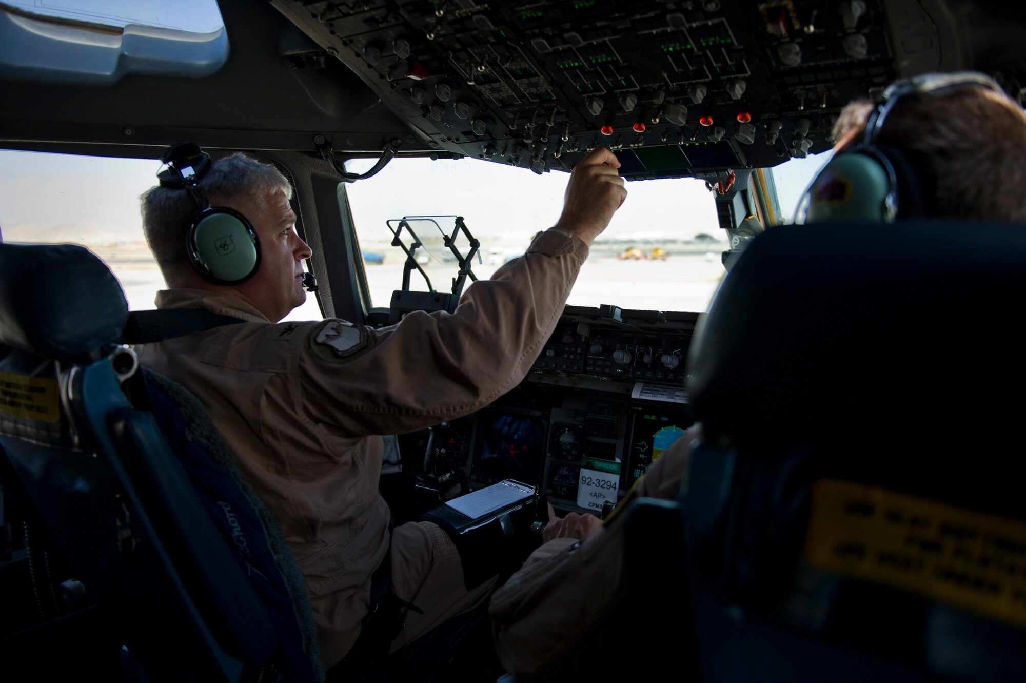 U.S. Air Force Col. Paul Eberhart, 385th Air Expeditionary Group commander, prepares to take-off on an airlift mission, July 25, 2013, Bagram Air Base, Afghanistan. The C-17 is capable of rapid strategic and tactical delivery of troops and any type of cargo around the Central Command area of reasonability. The aircraft can perform airlift, airdrop, and transport ambulatory patients during aeromedical evacuations when required. (U.S. Air Force photo/Staff Sgt. Marleah Miller)