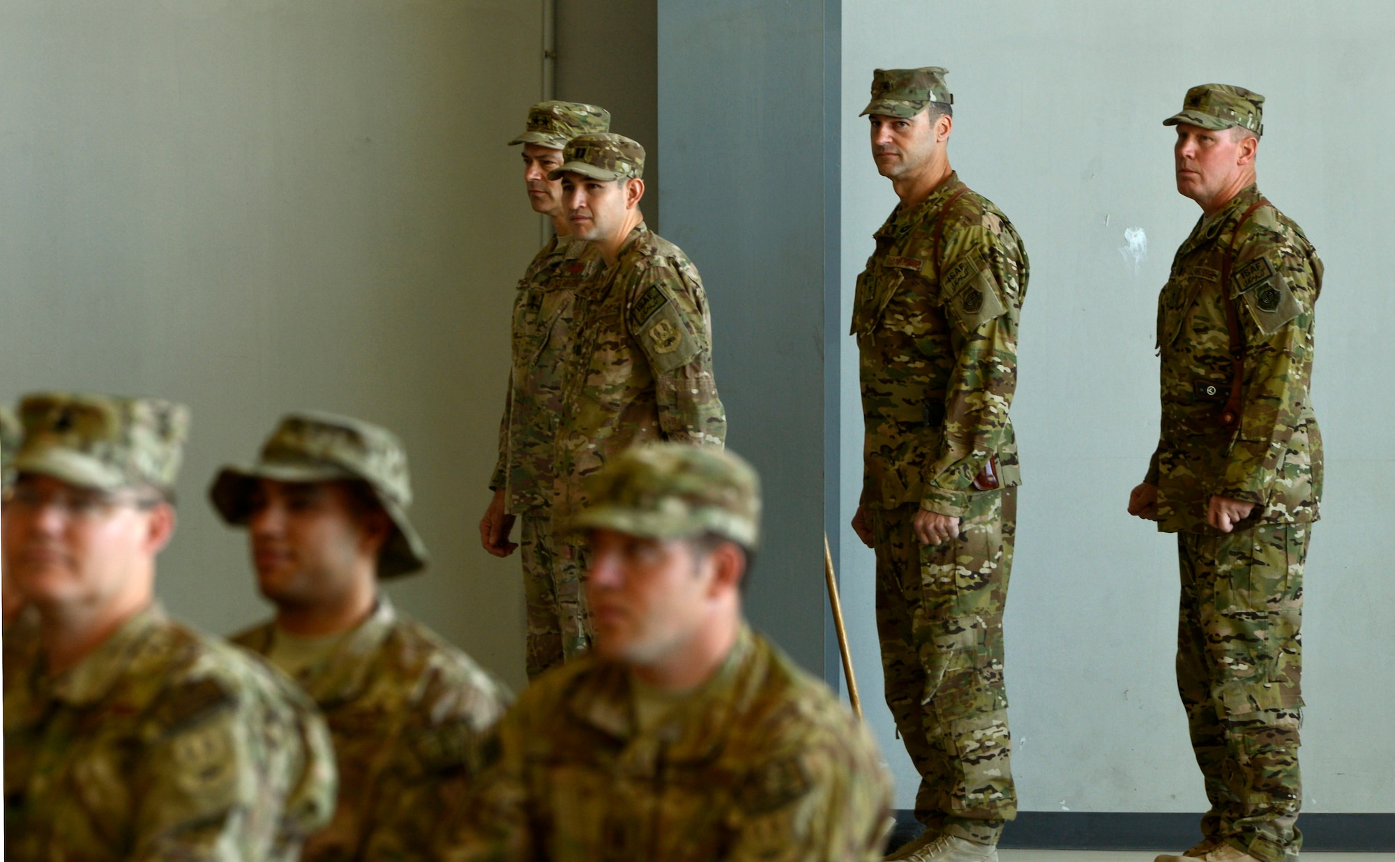 Capt. Rigoberto Perez, 455th Air Expeditionary Wing Chief of Protocol, supervises and assists with the execution of the wing change of command on Bagram Airfield, Afghanistan, July 8, 2013. (U.S. Air Force photo/Staff Sgt. Stephenie Wade)