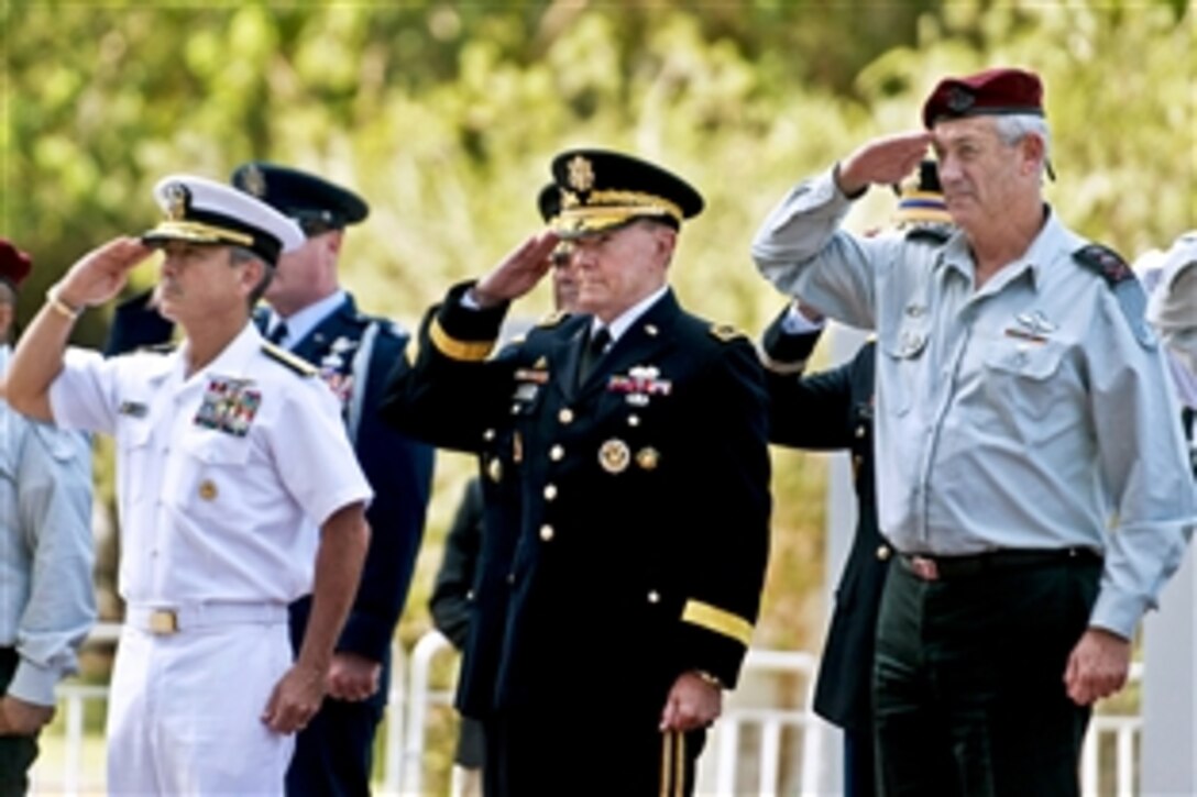 U.S. Army Gen. Martin E. Dempsey, chairman of the Joint Chiefs, and Israeli Lt. Gen. Benny Gantz, chief of the Israeli general staff, participate in an arrival ceremony at the Kirya, an area that includes an Israeli military base, in Tel Aviv, Israel, Aug. 13, 2013.