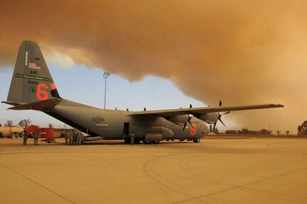 A C-130J from the 146th Airlift Wing at Channel Islands ANGS, Port Hueneme, CA is being prepared for possible use on the wildfires in the Camarillo Springs area today. The aircraft from the California Air National Guard is equipped with the Modular Airborne Fire Fighting Systems or MAFFS and can drop up to 3000 gallons of fire retardant at any one time.