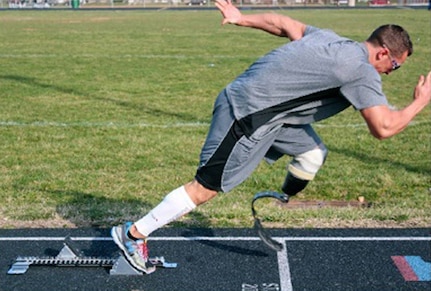 Senior Airman Gideon L. Connelly practices at a Baltimore area track. Connelly, a repair and reclamation crew chief, 175th Maintenance Squadron, was involved in a motorcycle accident with serious damage to his left leg in July 2011. He is training for the Paralympics.