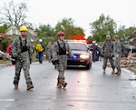 Members of the 63rd Civil Support Team, Oklahoma National Guard, conduct search and rescue operations in Moore, Okla. Chaplains are ministering to Airmen and Soldiers there.