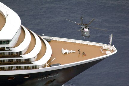 129th Rescue Wing and 58th Rescue Squadron pararescuemen hoist a passenger off the bow of the Holland America cruise ship, ms Westerdam on May 5, 2013, one of many saves the units have performed.