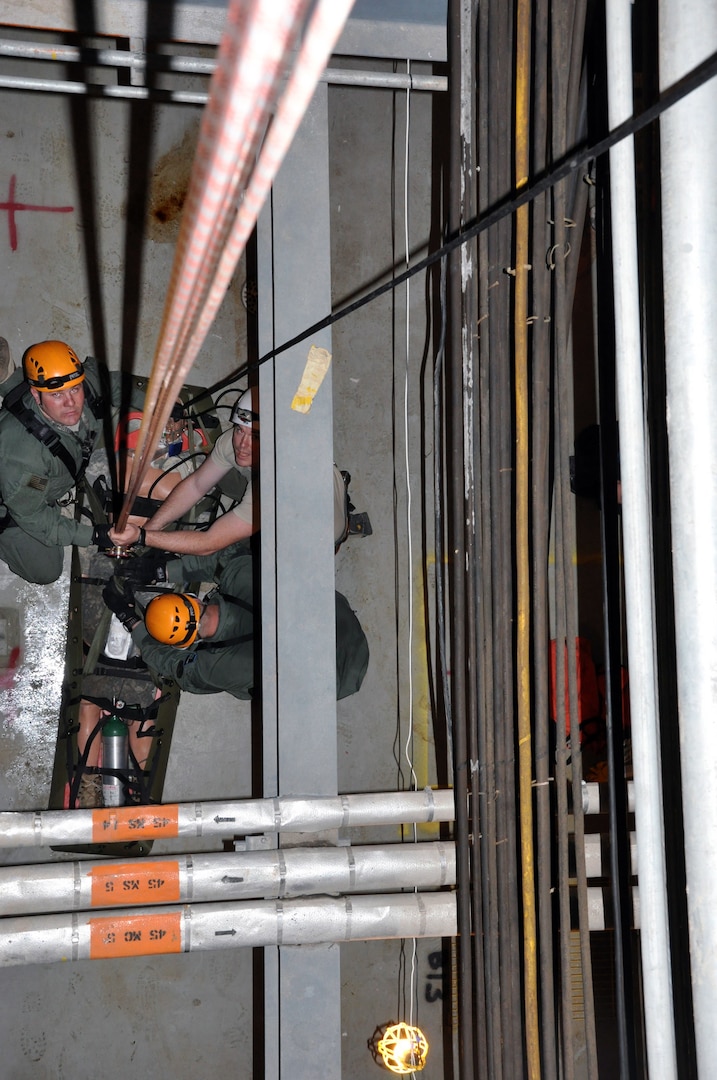 Members of the 15th Civil Support Team, Vermont National Guard, conduct Joint CBRNE (Chemical, Biological, Radiological, Nuclear and Explosive weapons) and high angle ropes rescue training with instructors of the Army Mountain Warfare School at the Government Training Institute in Barnwell, S.C.