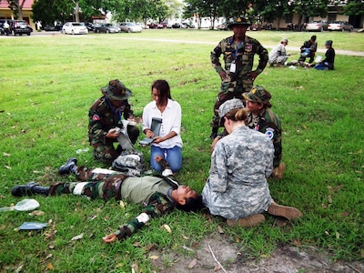 The Medical First Responders course was conducted with the Royal Cambodian Armed Forces and Idaho National Guard Soldiers during Angkor Sentinel 2013, May 18-27, 2013. Pictured here, heart rates escalated as a Royal Cambodian Armed Forces comrade had suffered a simulated gunshot wound to the chest, fractured femur, lower leg amputation, and second-degree burns on both arms during the practical exam.