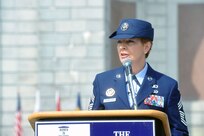 Air Force Chief Master Sgt. Denise Jelinski-Hall makes remarks on behalf of honorees at the Women in the Military Wreath Laying Ceremony sponsored by the Congressional Caucus on Women's Issues, at the Women in Military Service for America Memorial at Arlington National Cemetery, May 22, 2013.