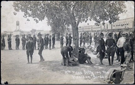 Soldiers from the Massachusetts National Guard 8th Infantry disembark from a train stopped in Columbus, N.M., on or about July 1, 1916. The Massachusetts Guardsmen were among the first National Guard units to arrive in Columbus after their 2,000-mile journey from Boston, after President Wilson federalized the entire force on June 18, 1916, the first use of the National Defense Act signed into law 15 days earlier.