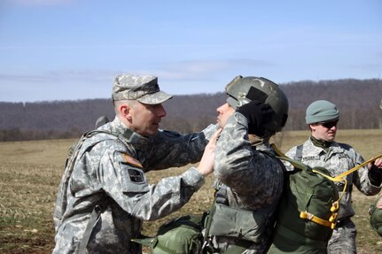 Lt. Col. Bradley Martsching performs a Jumpmaster Personnel Inspection on Spc. Moises Sanchez of C Company (Long Range Reconnaissance), prior to a planned airborne operation on Bitner drop zone near Little Orleans, Md.