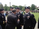 Gen. Frank Grass, chief of the National Guard Bureau, and Massachusetts Gov. Deval Patrick at awards ceremony for heroic Guard members who immediately responded at Boston Marathon bombing.