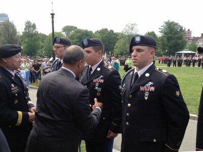 Gen. Frank Grass, chief of the National Guard Bureau, and Massachusetts Gov. Deval Patrick at awards ceremony for heroic Guard members who immediately responded at Boston Marathon bombing.