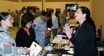 Sharin Baker, Military One Source, shares information about what they can do for military retirees at the 63rd Regional Support Command pre-retirement seminar, held at the Moffett Field Army Reserve Center.